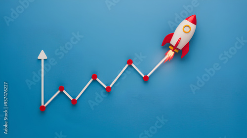 Concept of the early stages of a business, start-up growth represented through line graphs and a rocket, against a blue background