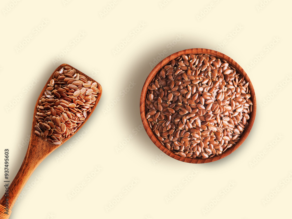 Flax Seeds in wooden bowl with spoon isolated on white background , top view , flat lay. Flax Seeds in wooden bowl with spoon isolated on white background , top view , flat lay.