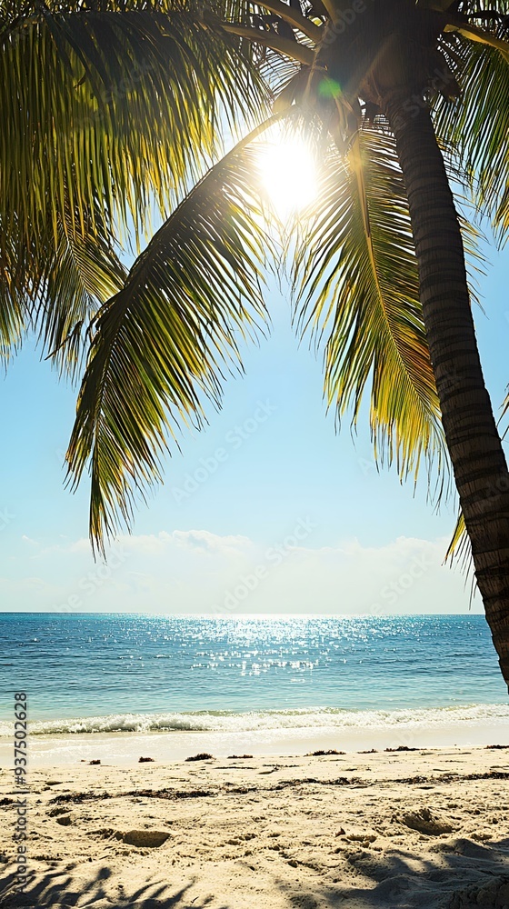 Naklejka premium Palm Tree and Ocean Scene with Sun Shining Through
