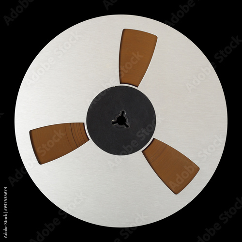 Vintage Music and sound - Closeup Aluminum reel Magnetic tapes isolated black