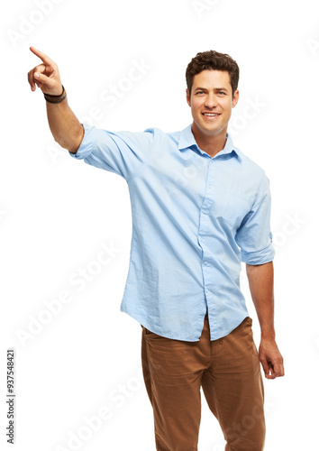 Studio, presentation and man in portrait pointing at promotion offer, choice or decision. Announcement, opportunity and person with smile showing direction, deal info or advice on white background