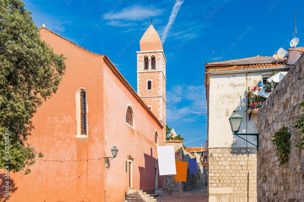 Street and cathedral tower view in town of Rab, Croatia