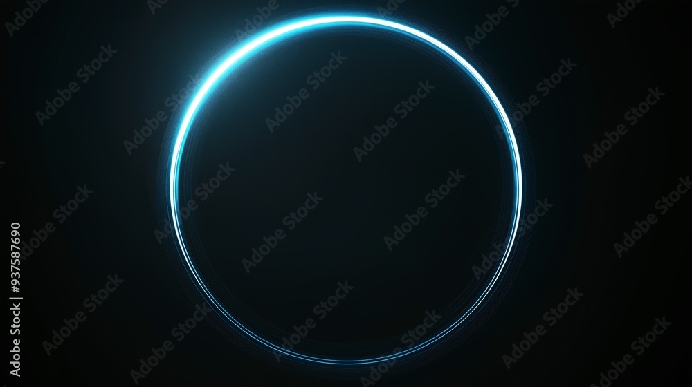 A glowing blue ring on a black background. A glowing blue ring on a black background.
