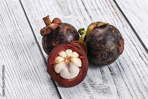 Tropical exotic purple sweet mangosteen photo