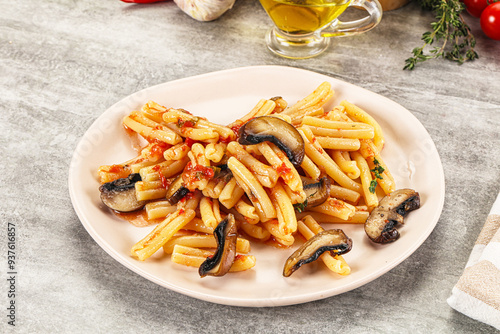 Italian cuisine - casafecce with mushrooms photo