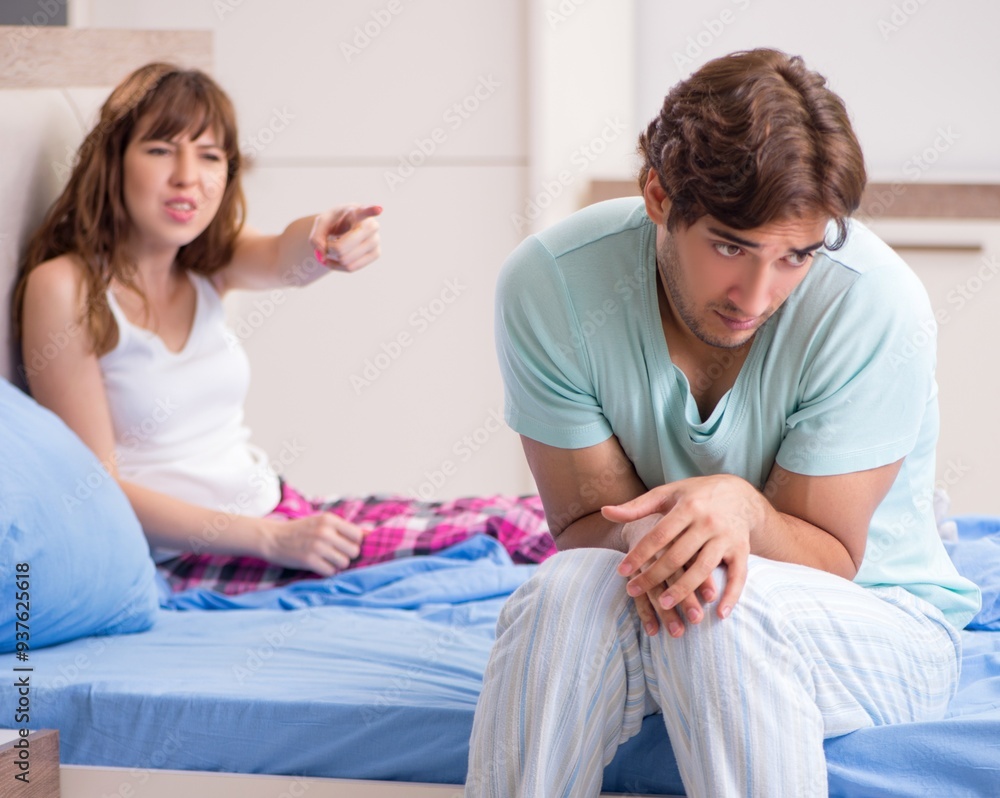 Obraz premium Young couple in the bedroom