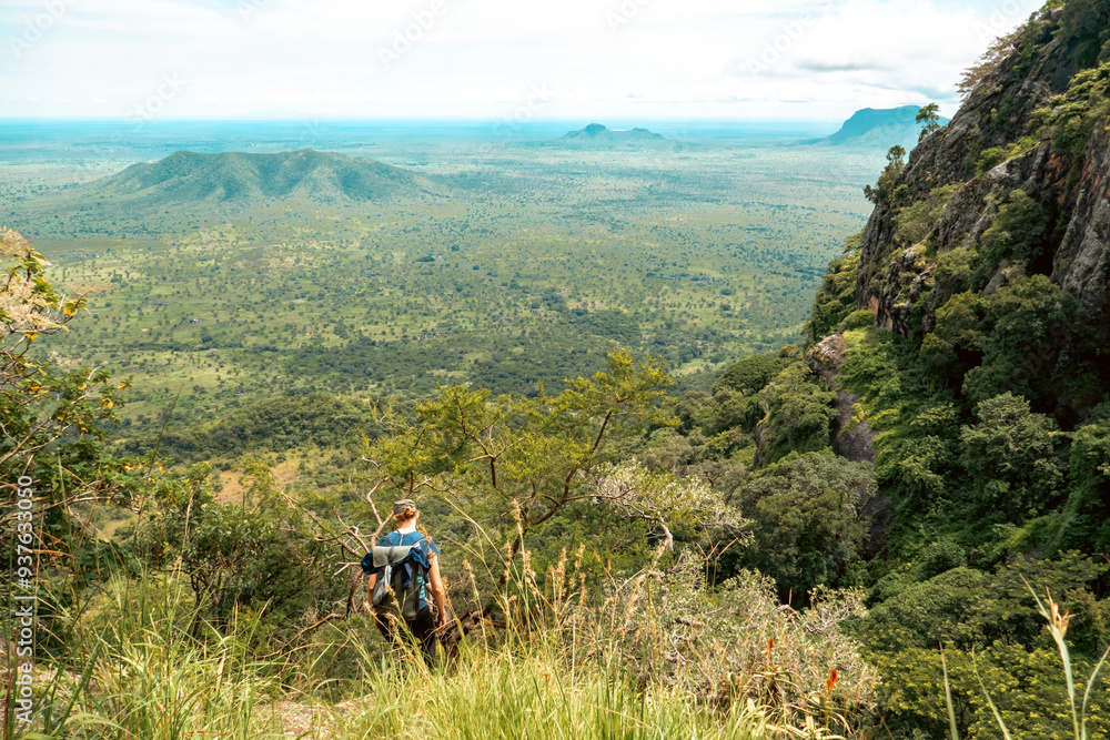 Scenic view of a hiker against a Mountain background at Mount Napak in Karamoja, Uganda
Scenic view of a hiker against a Mountain background at Mount Napak in Karamoja, Uganda