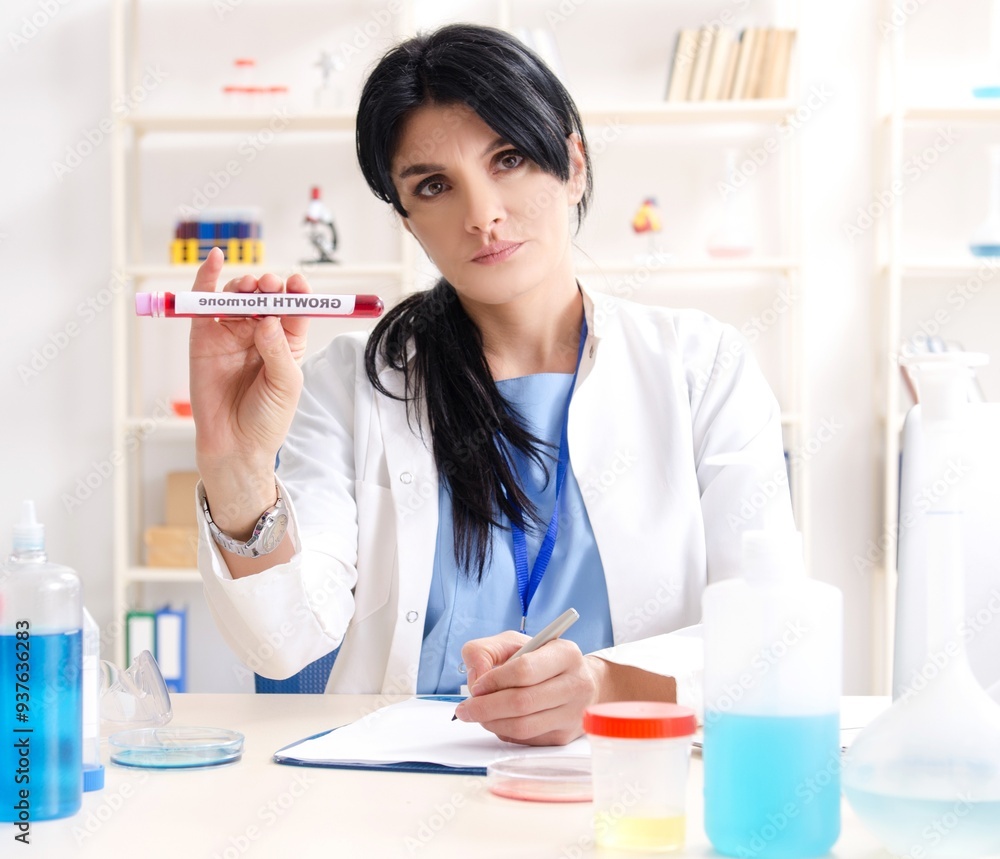 Female chemist working at the lab Female chemist working at the lab