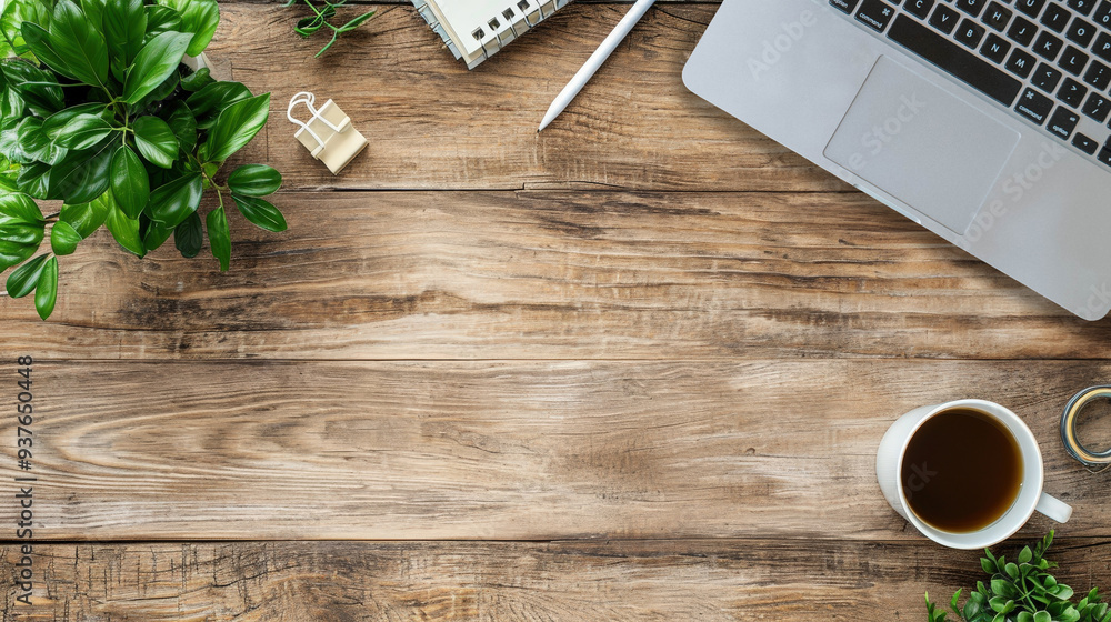 Wooden workspace with laptop, coffee, plants, and office supplies in a clean and organized setting. Wooden workspace with laptop, coffee, plants, and office supplies in a clean and organized setting.