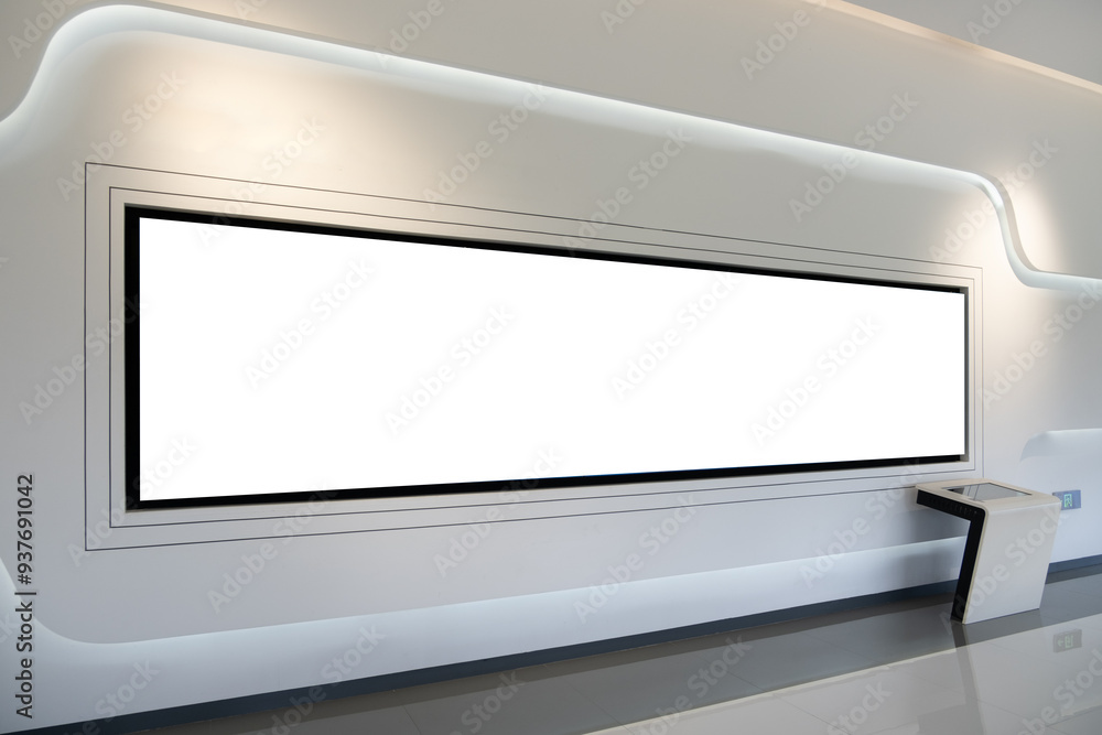 Blank white mockup background of a modern, minimalist interior featuring a large, blank rectangular space on a white wall, with a digital display or screen that has a sleek and futuristic aesthetic. Blank white mockup background of a modern, minimalist interior featuring a large, blank rectangular space on a white wall, with a digital display or screen that has a sleek and futuristic aesthetic.