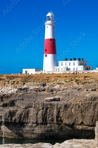 Fotografija Red and white painted Portland Bill Lighthouse on the Isle of Portland, just sou