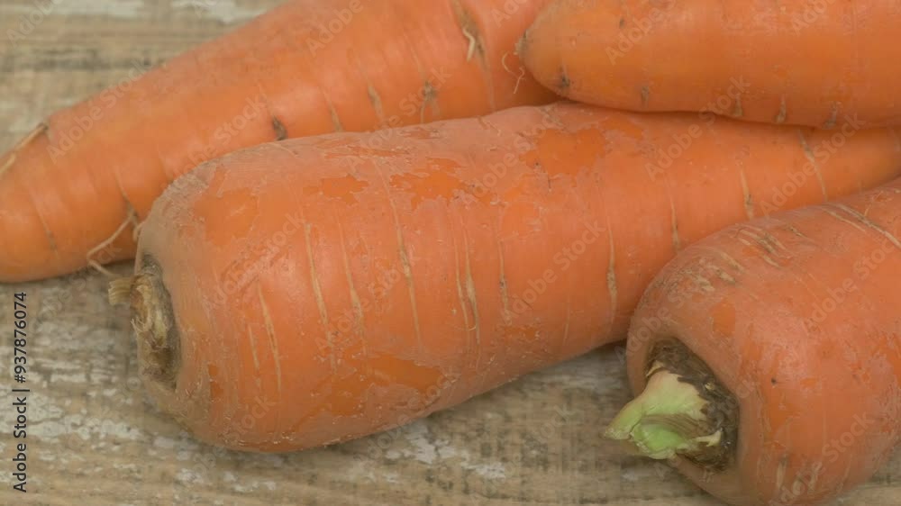 Fresh Organic Carrots Lying Beautifully on a Rustic Wooden Table Ready for Your Kitchen Fresh Organic Carrots Lying Beautifully on a Rustic Wooden Table Ready for Your Kitchen