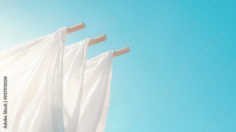 close-up of white laundry fluttering gently in the breeze under a clear blue sky, with warm sunlight adding a touch of brightness, evoking a sense of cleanliness and freshness, pho close-up of white laundry fluttering gently in the breeze under a clear blue sky, with warm sunlight adding a touch of brightness, evoking a sense of cleanliness and freshness, pho