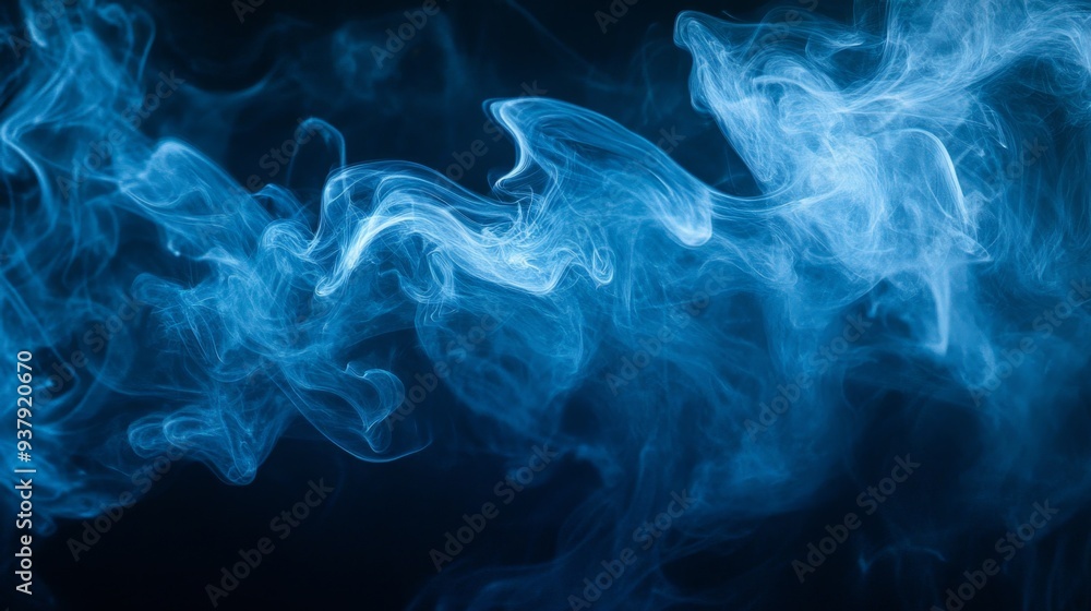 Abstract blue smoke swirling against a black background, mysterious and ethereal Abstract blue smoke swirling against a black background, mysterious and ethereal