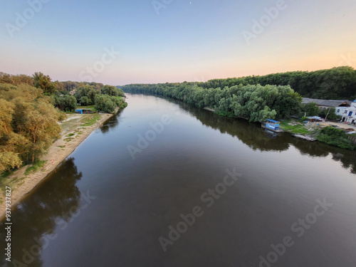 The Desna River in the evening in the summer on a cloudless day. View from above. Chernihiv, Ukraine.