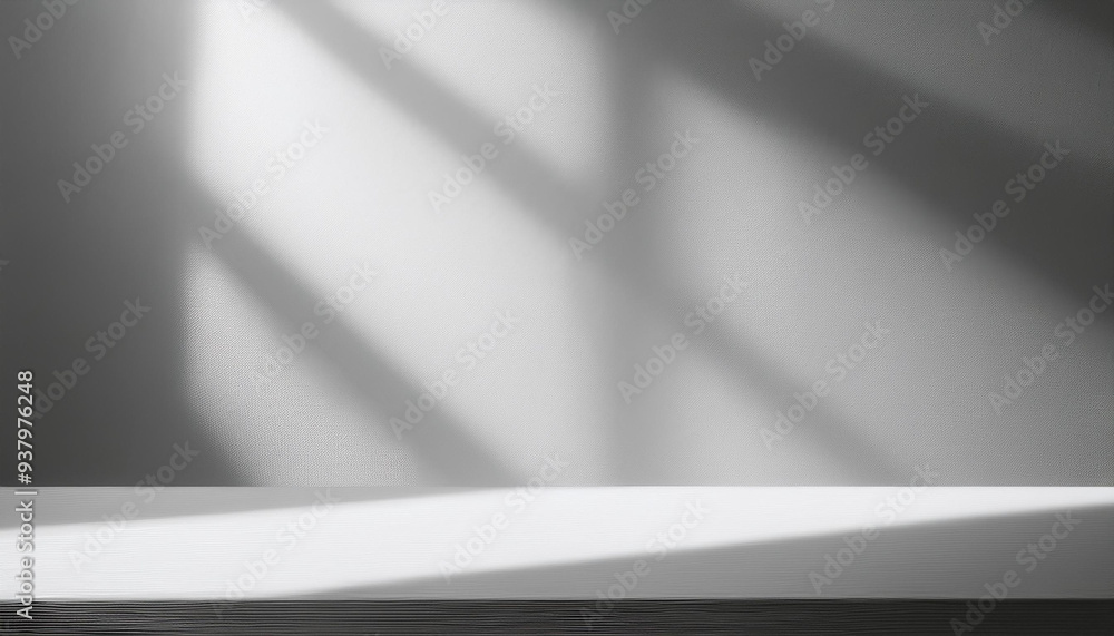 A white wall with a window and a shadow on it A white wall with a window and a shadow on it