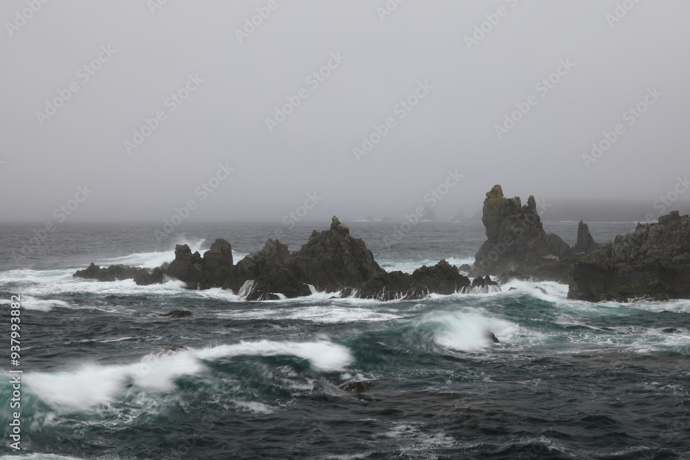 A rocky shoreline on the Atlantic Ocean in The Dungeon Provincial Park, Bonavista Peninsula Newfoundland and Labrador, Canada. A rocky shoreline on the Atlantic Ocean in The Dungeon Provincial Park, Bonavista Peninsula Newfoundland and Labrador, Canada.