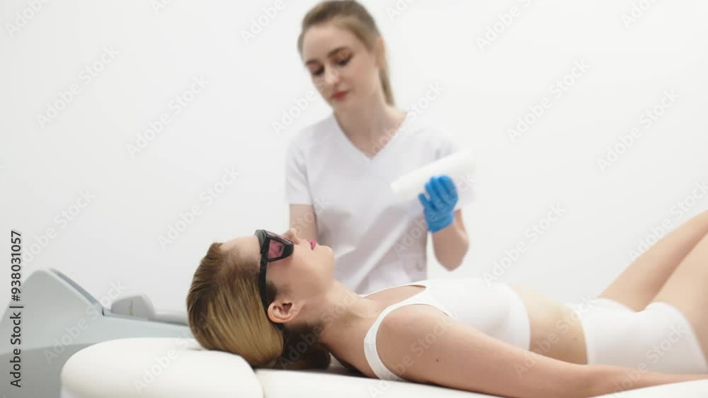 A professional cosmetologist provides a consultation to a young woman before a laser hair removal session. Emphasizing personalized care and expertise in modern skincare treatments. A professional cosmetologist provides a consultation to a young woman before a laser hair removal session. Emphasizing personalized care and expertise in modern skincare treatments.