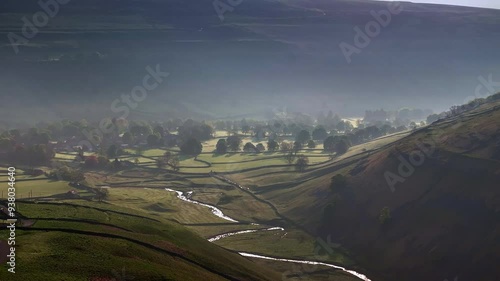 Aerial footage which emphasizes the river's journey as it carves its way through Arncliffe, highlighting the natural contrasts and beauty	 photo