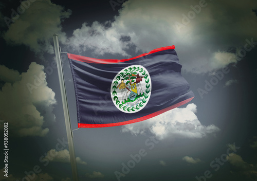 Belize national flag blowing in grey dramatic beautiful clouds. Belize national flag for independence day. photo