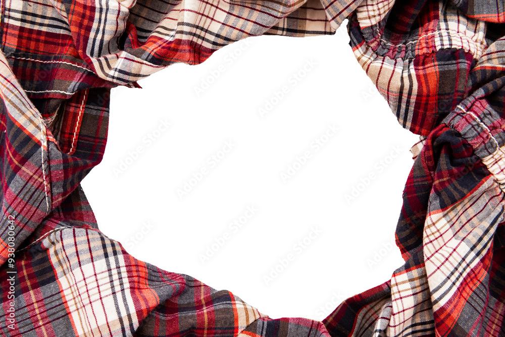 Hole in checkered fabric. Fabric frame on white background. Textile with empty space for inscription or logo Hole in checkered fabric. Fabric frame on white background. Textile with empty space for inscription or logo