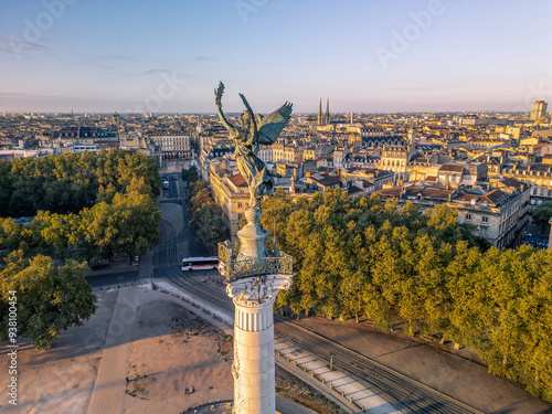 The drone aerial view of The Girondins Monument and Bordeaux city at sunrise. Monument aux Girondins (The Girondins Monument) is a dramatic fountain statue in Bordeaux. 