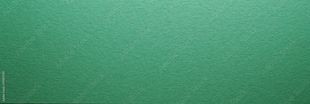 Textured green background with subtle grain pattern for creative uses or design projects Textured green background with subtle grain pattern for creative uses or design projects