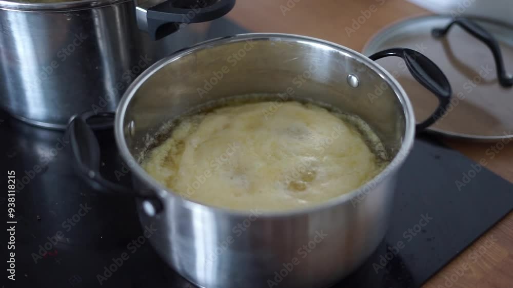 ghee is boiled in a saucepan ghee is boiled in a saucepan