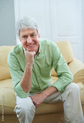 Smile, relax and portrait of old man on sofa in home with confidence, wellness and retirement. Happy, calm and senior person on couch in living room with pride, peace and weekend morning in apartment