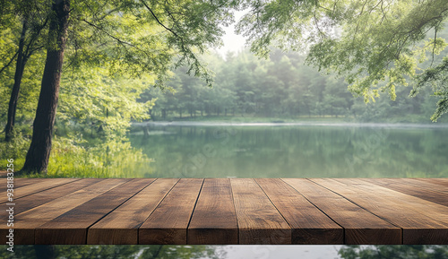 Wooden table top with a beautiful green forest and lake background
