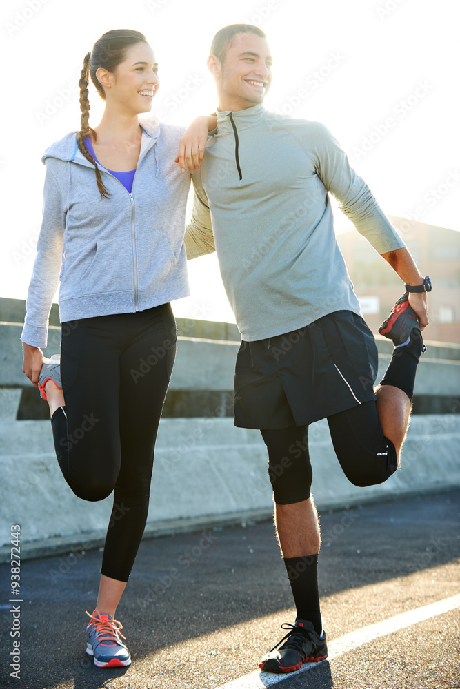 Fototapeta premium Happy couple, stretching and street with fitness for workout preparation, exercise or training together in city. Man, woman and runners enjoying warm up or getting ready for running in an urban town