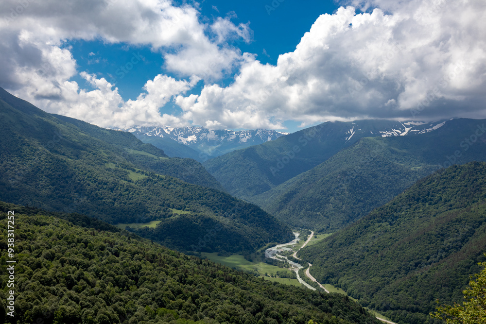 Naklejka premium landscape with mountains and clouds