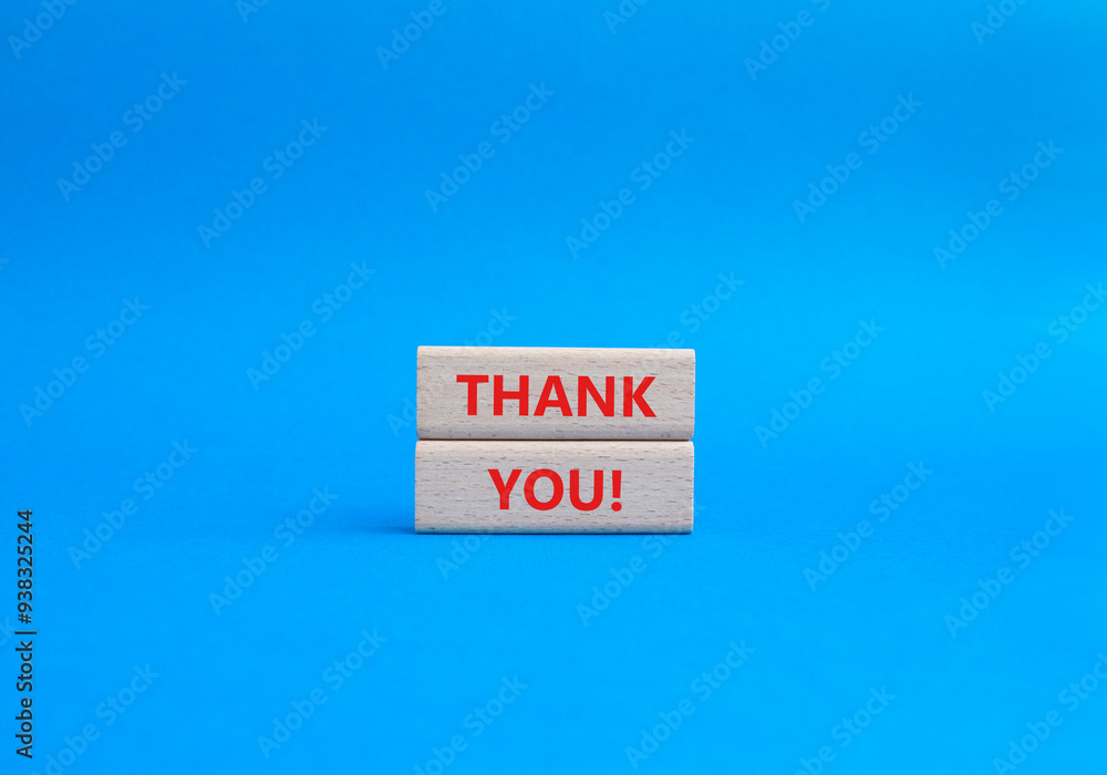 Thank you symbol. Wooden blocks with words Thank you. Beautiful blue background. Business and Thank you concept. Copy space. Thank you symbol. Wooden blocks with words Thank you. Beautiful blue background. Business and Thank you concept. Copy space.