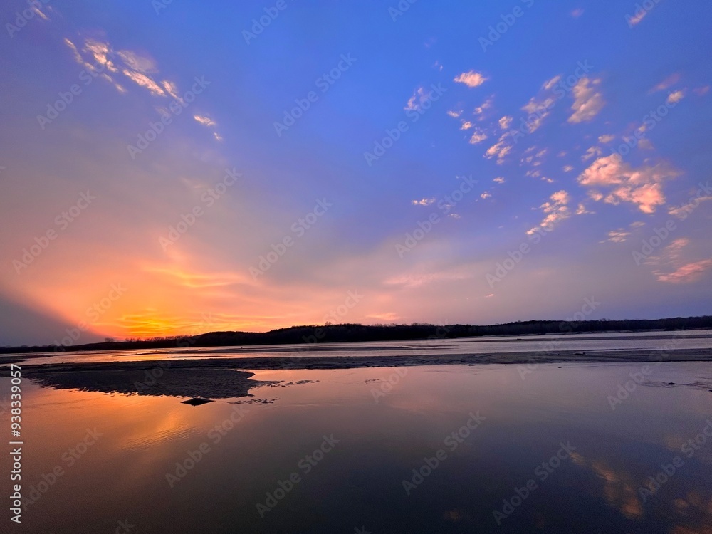 Obraz premium sunset over the river