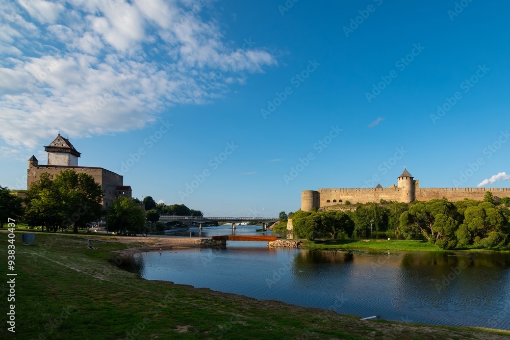 Fototapeta premium Narva fortress on the border of Estonia and Russia, unique view - the border of Europe and Asia, border of European Union and Russian Federation, fortresses on the bank of the river Narova