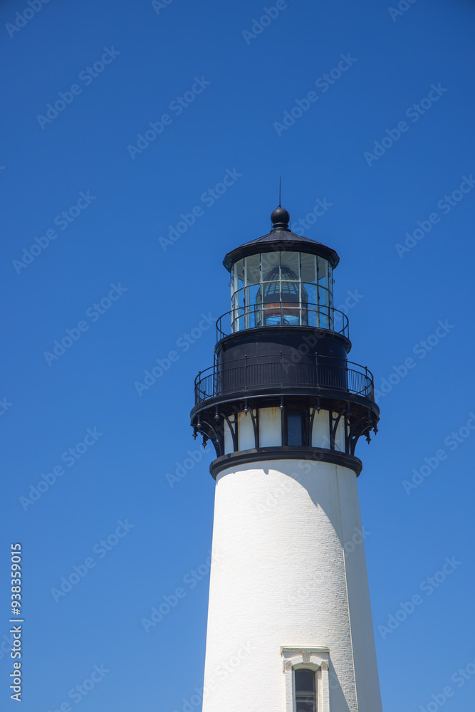 Yaquina Head Lighthouse against blue sky, in Oregon state, USA. Yaquina Head Lighthouse against blue sky, in Oregon state, USA.