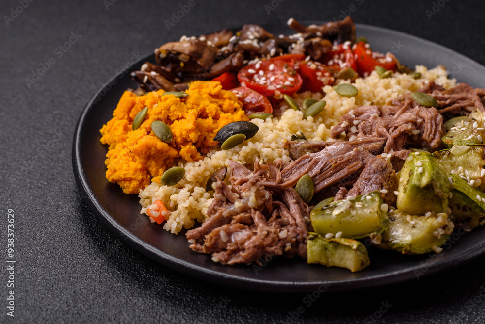 Bowl of food with beef, bulgur, tomatoes, mushrooms, zucchini Bowl of food with beef, bulgur, tomatoes, mushrooms, zucchini