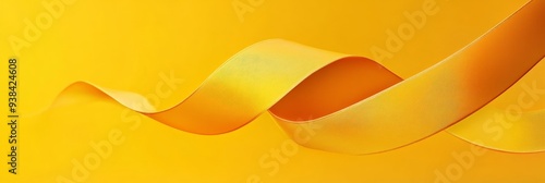 A vibrant yellow ribbon flows gracefully across a matching yellow background. The smooth curves and subtle gradient create a sense of movement and energy. This abstract image symbolizes growth, opport photo