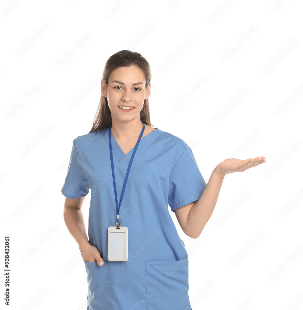Smiling nurse holding something on white background Smiling nurse holding something on white background