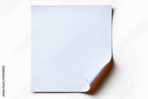 A blank white sheet of paper with a curled corner, perfect for concepts of creativity, design, and simplicity.