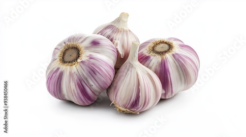 Four garlic bulbs with purple stripes, isolated on white background.