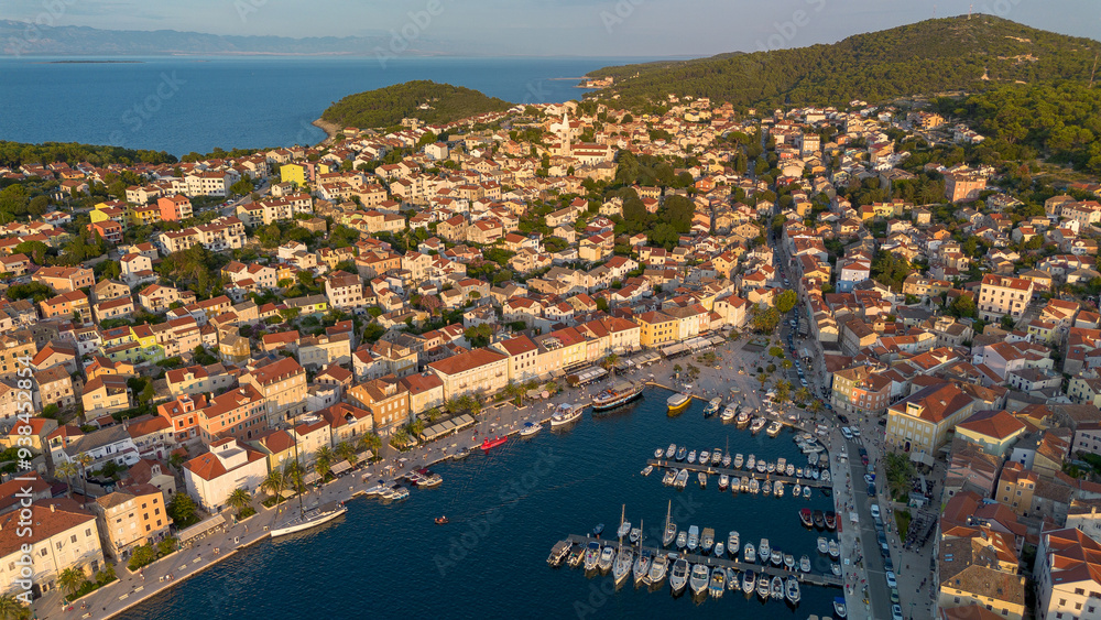 Fototapeta premium Aerial view of Mali Losinj with the setting sun, Croatia