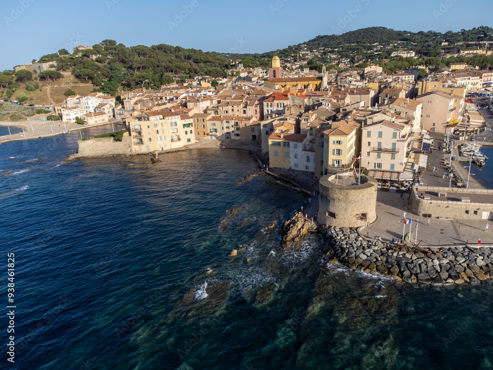 Fototapeta premium Aerial view on bays, beaches, old colorful houses of famous Saint-Tropez town on French Riviera, Var, Provence, France, summer vacation destination