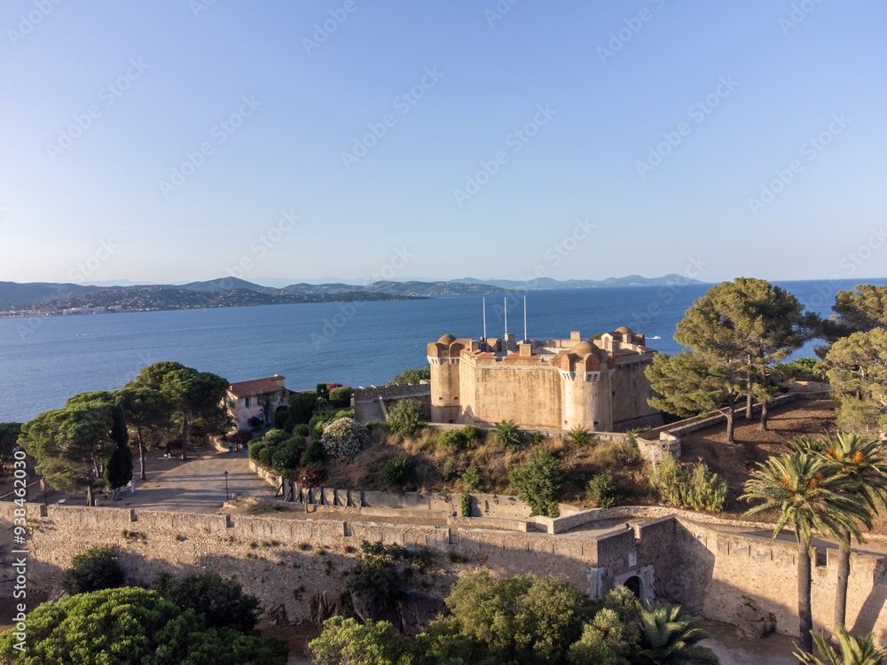 Obraz premium Aerial view on bay, hills,, old citadel fort, olorful houses of famous Saint-Tropez town on French Riviera, Var, Provence, France, summer vacation destination