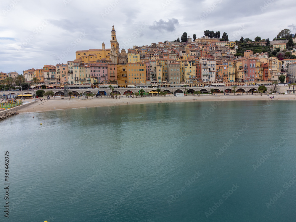 Fototapeta premium Aerial view on French Riviera, colorful Menton old city and marina on Mediterranean Sea near French-Italian border, travel destination, panoramic view from above