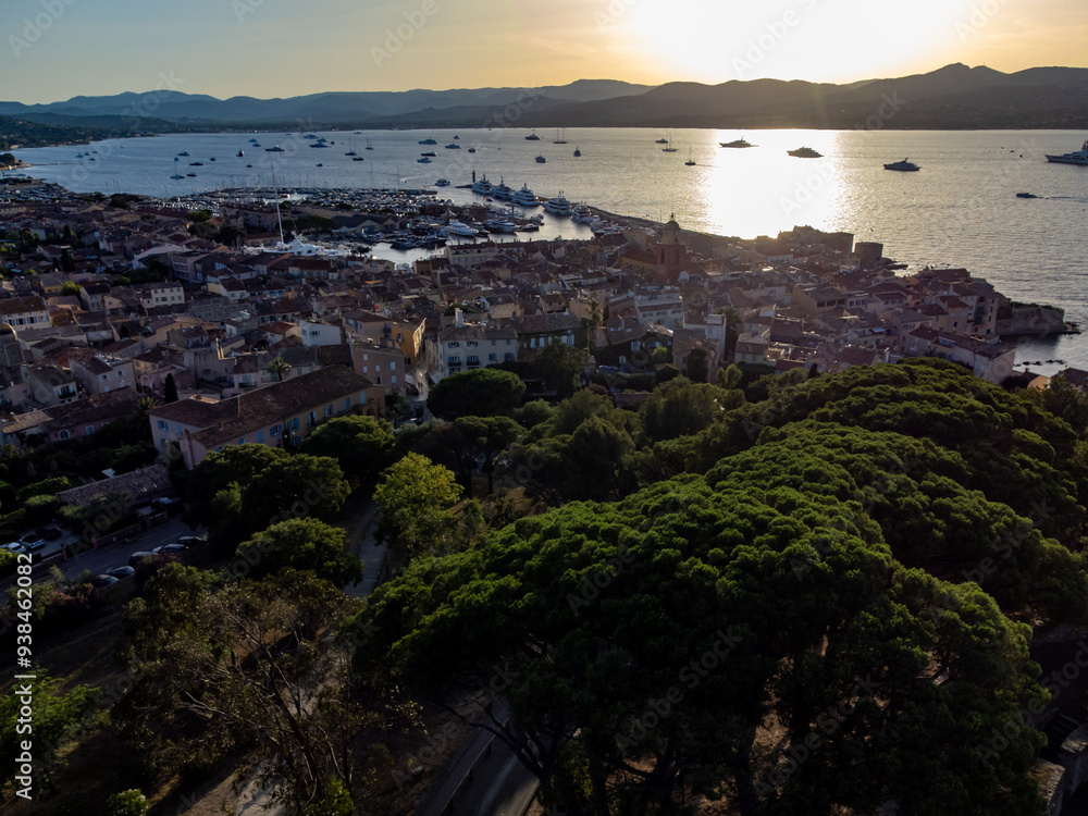 Obraz premium Aerial view on bay, hills,, old citadel fort, olorful houses of famous Saint-Tropez town on French Riviera, Var, Provence, France, summer vacation destination