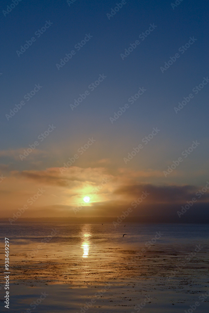 Beuatiful sunrise in Monterrey lake. Sun rising in a wonderful lake with birds. Beuatiful sunrise in Monterrey lake. Sun rising in a wonderful lake with birds.