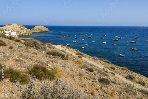 Coast of Cabo de Gata in the area of Isleta del Moro, a fishing town located near Los Escullos, Almeria Province, Andalusia, Spain photo