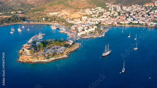 A stunning aerial view of Datça, Turkey. Amphitheater Peninsula separates Holiday village to two main beaches. Tranquil waters and anchored yachts enhance the idyllic scene