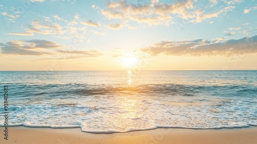 Golden Sunset Over Calm Ocean Waves on Sandy Beach